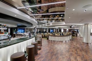 Haven Lounge on MSC Seaside features a bar, seating area and screens for guests | MSC Cruises