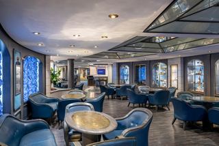Il Grappolo d'Oro wine bar features comfortable seating and a welcoming environment for guests | MSC Cruises