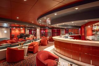 L'Atmosphere Piano Bar on MSC Lirica features inviting seating and a modern bar counter | MSC Cruises