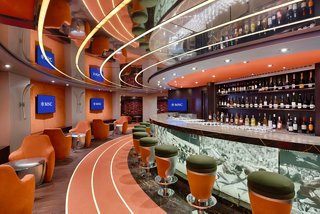 L'Olimpiade Sports Bar on MSC Magnifica features inviting seating and a vibrant bar space | MSC Cruises