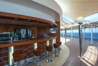 Laguna Bar on MSC Musica features a comfortable seating area with views of the sea and sky | MSC Cruises