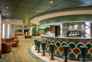 A welcoming bar with stylish seating and relaxing lounge areas aboard MSC Poesia | MSC Cruises