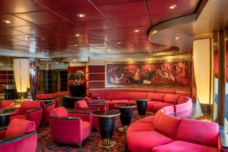 Pigalle Lounge features plush sofas and armchairs for relaxing moments onboard | MSC Cruises