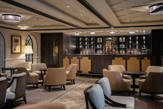 Bar counter and seating area in Raj Polo Tea House aboard MSC World Europa | MSC Cruises