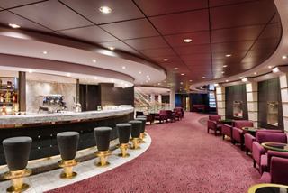 Ruby Bar aboard MSC Magnifica features a welcoming seating area and sleek bar counter | MSC Cruises