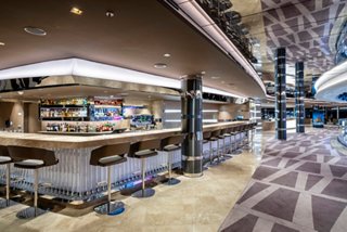 Shine Bar on MSC Seashore features inviting seating and a sleek bar counter for social moments | MSC Cruises