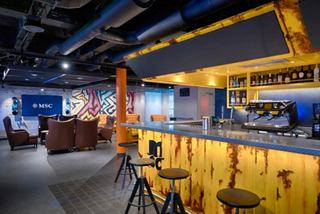 The Box Bar on MSC World America features cozy seating and a welcoming lounge area | MSC Cruises