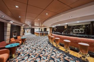 The onboard bar features inviting seating and a welcoming atmosphere for guests | MSC Cruises