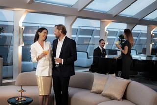 Guests enjoy cocktails and live piano music in the elegant Top Sail Lounge | MSC Cruises