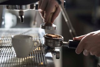 Barista prepares fresh espresso at Venchi 1878 Chocolate Bar on MSC Seaside | MSC Cruises
