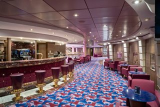Zaffiro Bar on MSC Orchestra offers comfortable seating and a welcoming bar counter | MSC Cruises