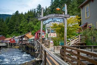 Colorful buildings and wooden walkways by the river in Ketchikan, Alaska | MSC Cruises