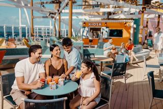 A family enjoying food on board MSC Cruises