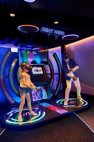 Family enjoying Beat Hero VR entertainment together on MSC Seashore | MSC Cruises