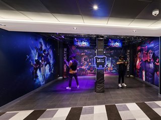 Guests enjoy an interactive virtual reality experience at the Hologate Arena | MSC Cruises