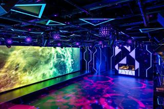 Luna Park Arena on MSC World Europa features vibrant lighting and a welcoming entertainment space | MSC Cruises