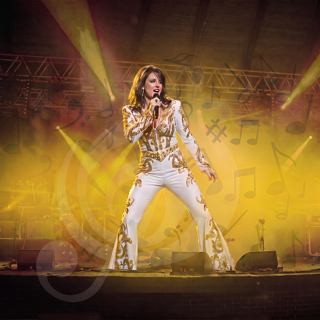 A performer sings on stage surrounded by vibrant yellow lighting | MSC Cruises