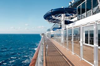 The deck of MSC Divina with panoramic sea views and a waterslide for teens | MSC Cruises