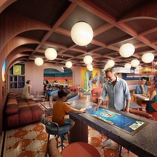 Welcoming clubhouse with guests enjoying leisure and social activities together | MSC Cruises