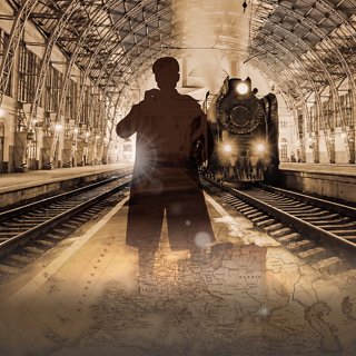 A traveler with a suitcase stands on a bright station platform as a train approaches | MSC Cruises