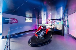 Formula 1 simulator in the Hall of Games on MSC Seashore offers an interactive experience | MSC Cruises