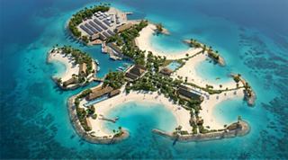 A tropical island with lush greenery and white sandy beaches surrounded by vibrant turquoise waters | MSC Cruises