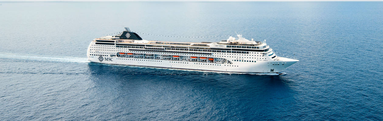 A cruise ship glides across the serene blue sea, inviting new horizons | MSC Cruises