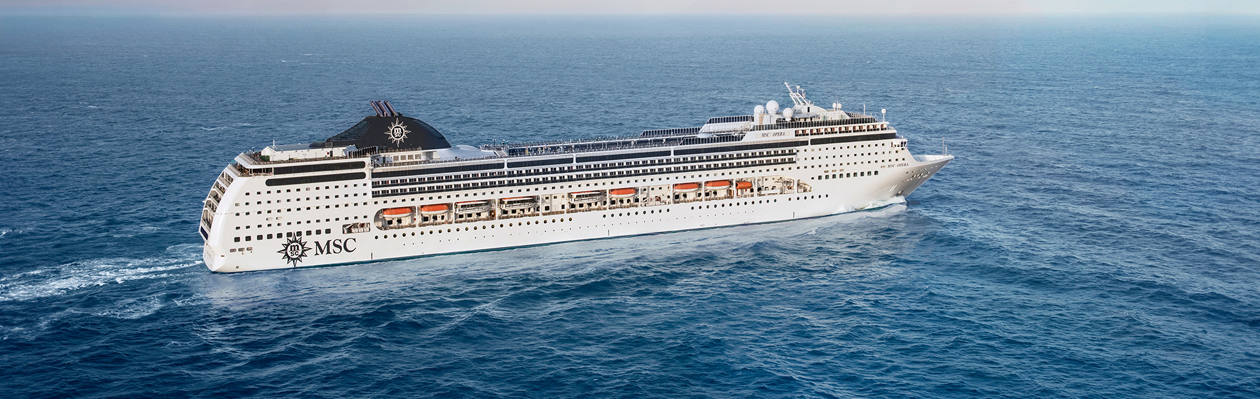 A cruise ship glides across the sparkling blue sea, inviting exploration and adventure | MSC Cruises