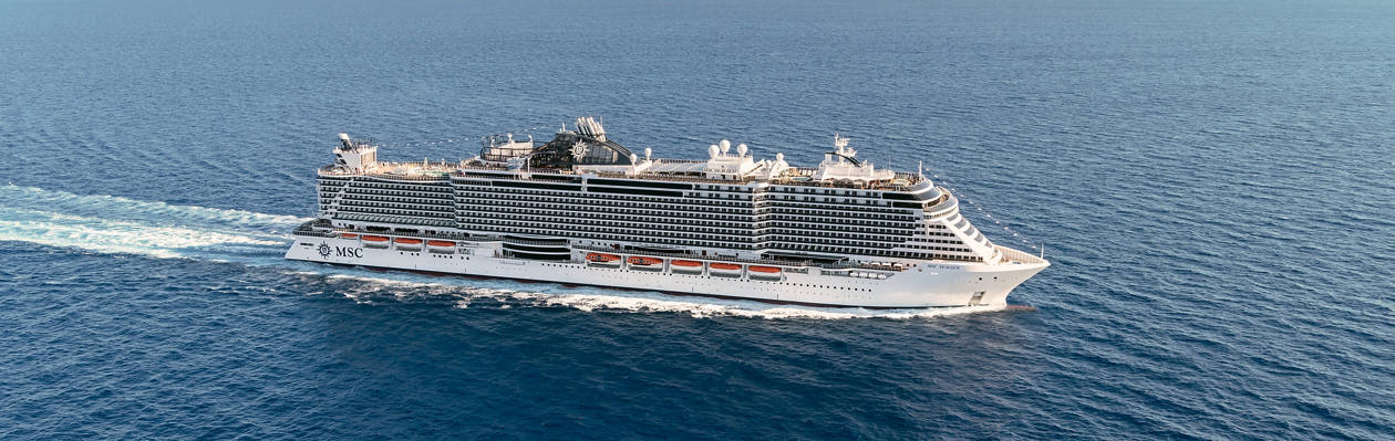 MSC Seaview cruise ship sails across open sea beneath a clear blue sky | MSC Cruises