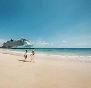 couple enjoying the beach on an MSC cruise