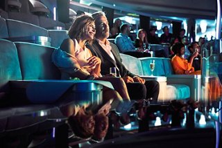 Couple enjoying a theater show on board a MSC Cruise