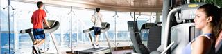 Guests training in the onboard gym area | MSC Cruises