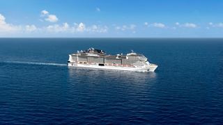 Ein majestätisches Kreuzfahrtschiff gleitet durch den ruhigen blauen Ozean unter einem klaren Himmel | MSC Cruises