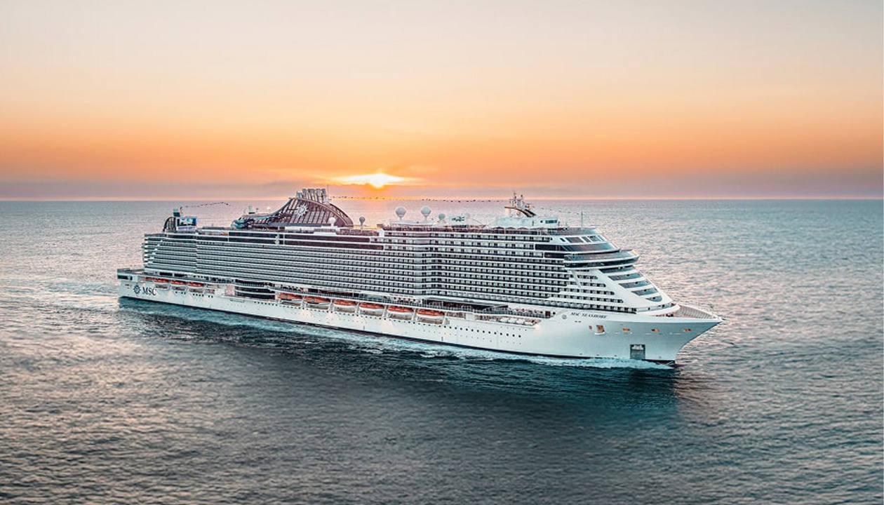 A cruise ship sails on the sea at sunset, inviting a sense of adventure | MSC Cruises