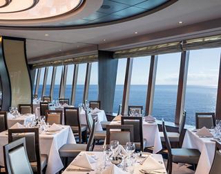 An elegant restaurant with panoramic views, perfect for special occasions | MSC Cruises