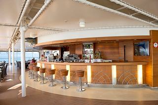 A welcoming bar area on MSC Musica, featuring a polished counter and comfortable seating | MSC Cruises