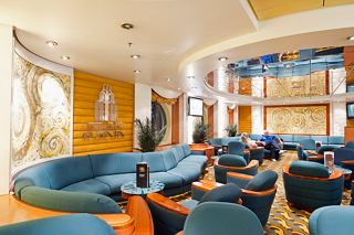 A welcoming lounge area on MSC Musica featuring comfortable seating and a vibrant atmosphere for relaxation | MSC Cruises