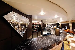 The elegant interior of The Diamond Bar on MSC Musica invites guests to unwind and enjoy a refined atmosphere | MSC Cruises