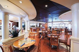 A welcoming dining area in Gli Archi Cafeteria on MSC Musica, with elegant seating and a relaxed atmosphere | MSC Cruises