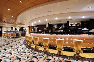 The elegant interior of The Diamond Bar on MSC Musica, featuring a stylish bar counter and inviting seating | MSC Cruises