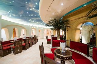 A vibrant lounge area on the MSC Preziosa featuring elegant seating and decorative elements for relaxation | MSC Cruises