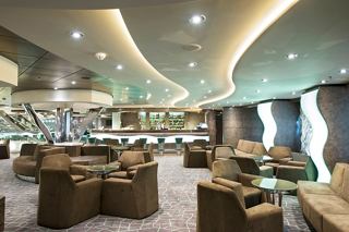 A stylish lounge area with comfortable seating and a welcoming atmosphere for relaxation and socialising | MSC Cruises
