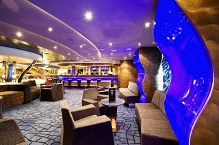 A welcoming bar area on MSC Splendida with comfortable seating and an inviting atmosphere | MSC Cruises