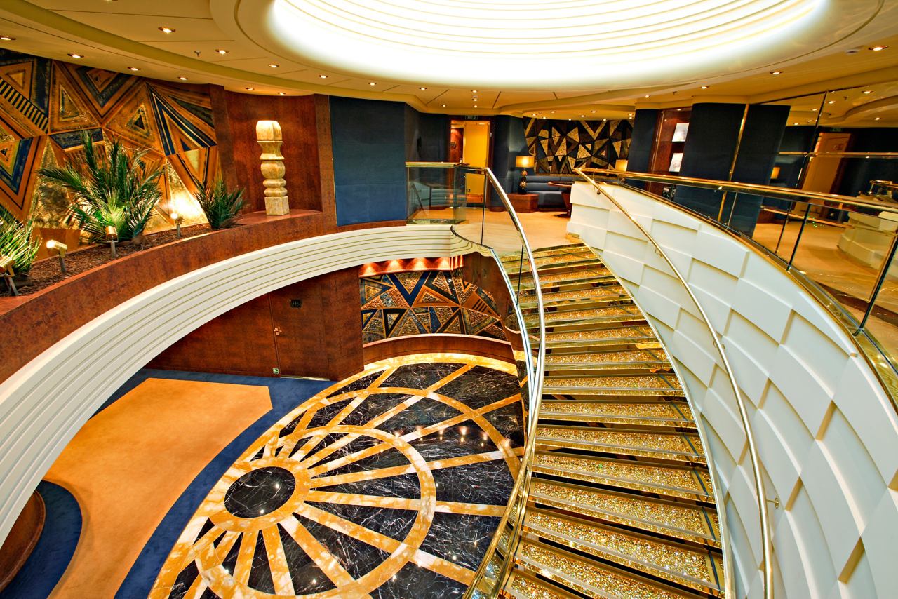 A welcoming view of the elegant concierge area in the MSC Yacht Club aboard MSC Splendida | MSC Cruises