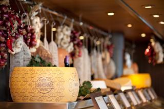 A selection of cheeses displayed elegantly in the Mediterranean Corner on MSC Splendida | MSC Cruises
