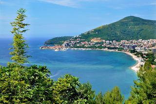 A stunning view of Montenegro's coastline with lush greenery and vibrant blue waters | MSC Cruises