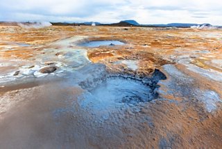 A geothermal area with steaming hot springs and colourful mineral deposits in Iceland's stunning landscape | MSC Cruises