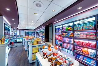 A vibrant shop on MSC Lirica, showcasing a range of products and colourful displays for guests to explore | MSC Cruises