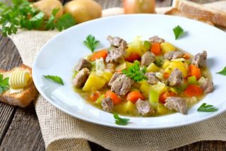 A hearty Irish stew with lamb, potatoes, carrots, and parsley, garnished for a delightful dining experience | MSC Cruises