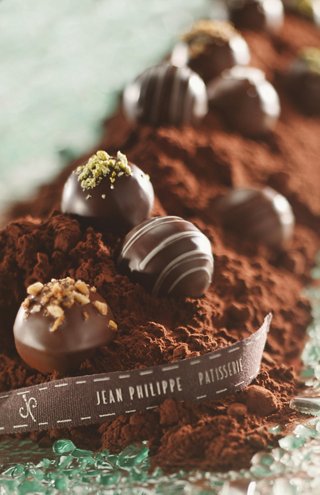 Delicious chocolate truffles dusted with cocoa powder, ready to delight your senses | MSC Cruises